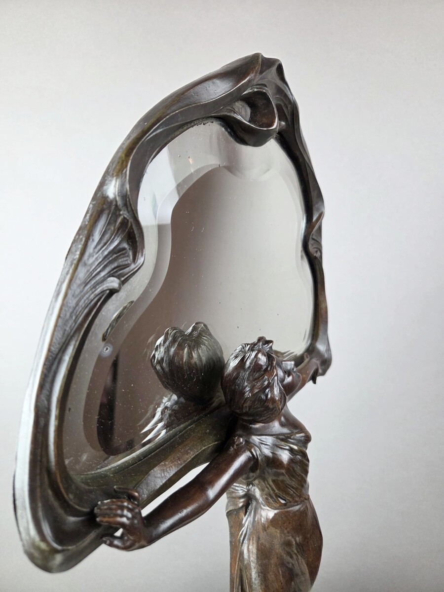 F. Floria, Art Nouveau mirror in patinated spelter