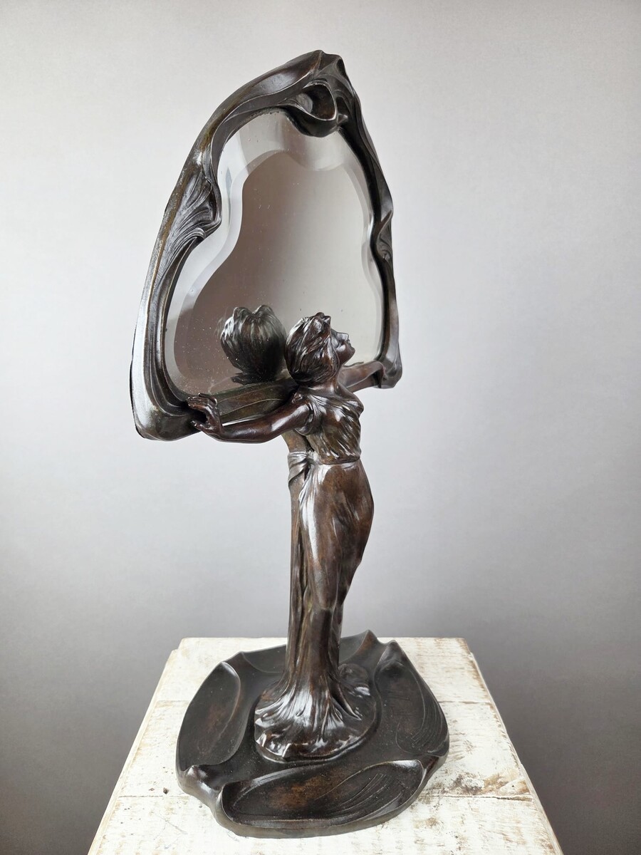 F. Floria, Art Nouveau mirror in patinated spelter