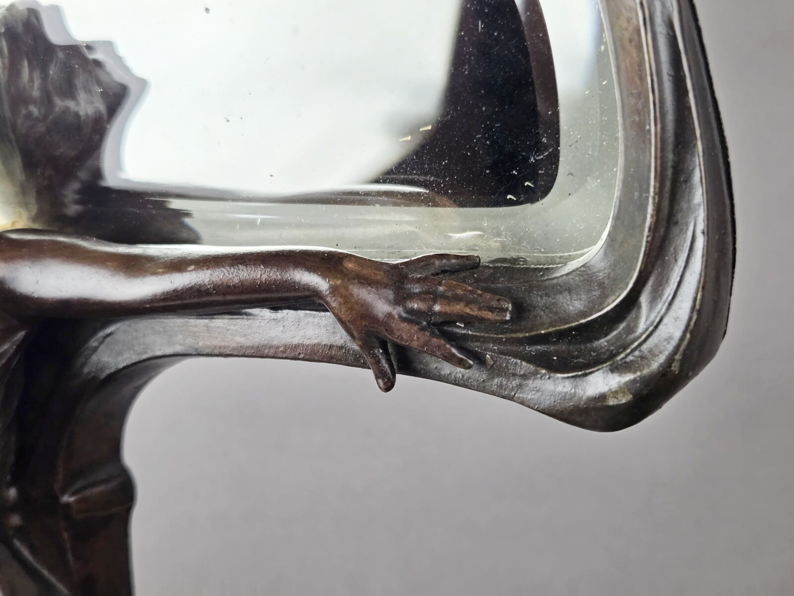 F. Floria, Art Nouveau mirror in patinated spelter