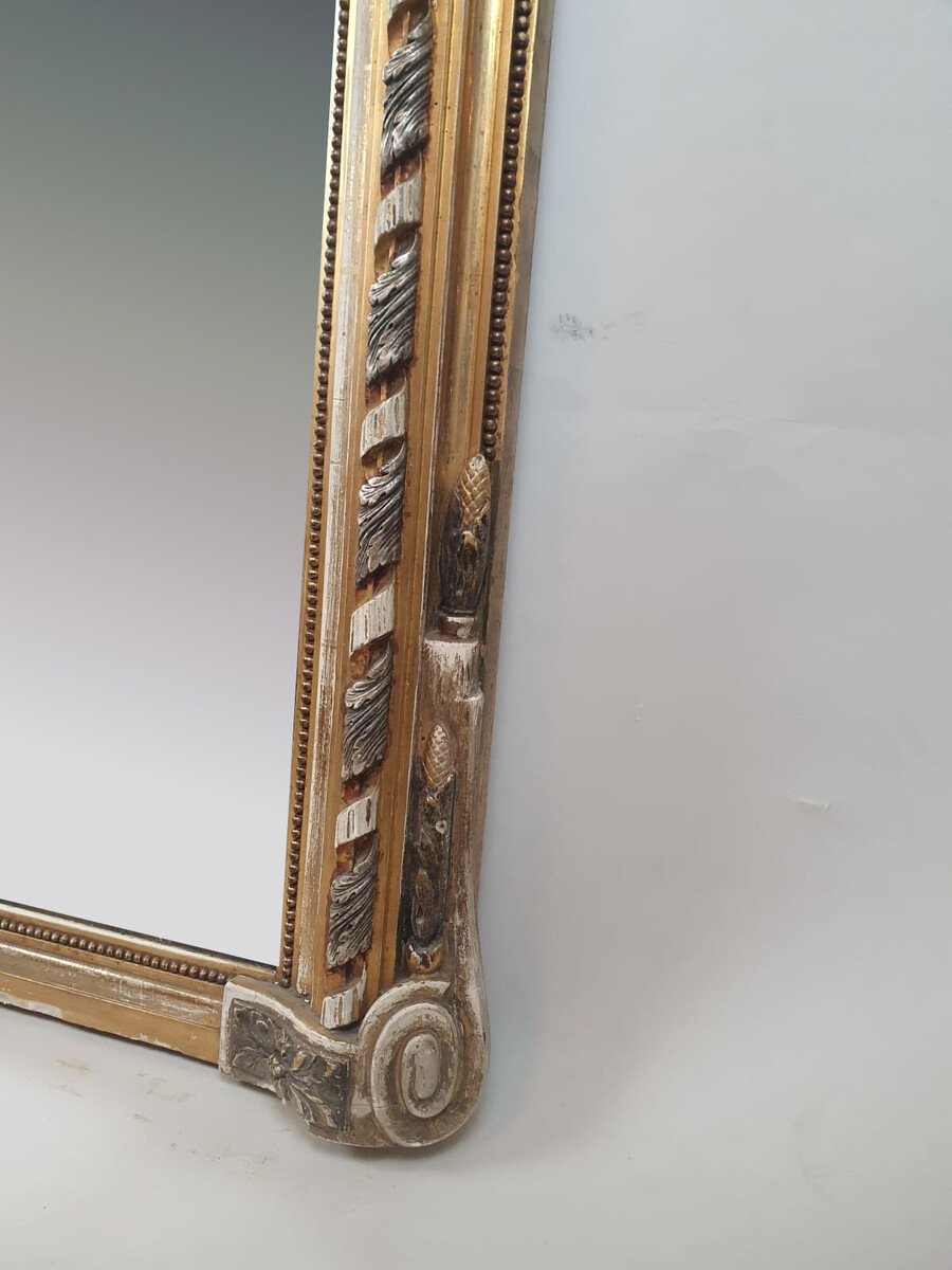 Fireplace mirror in wood and gilded stucco, 19th