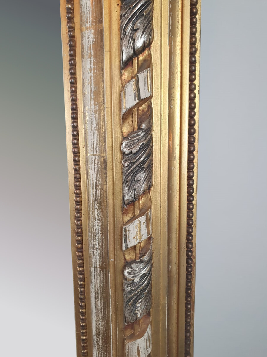 Fireplace mirror in wood and gilded stucco, 19th