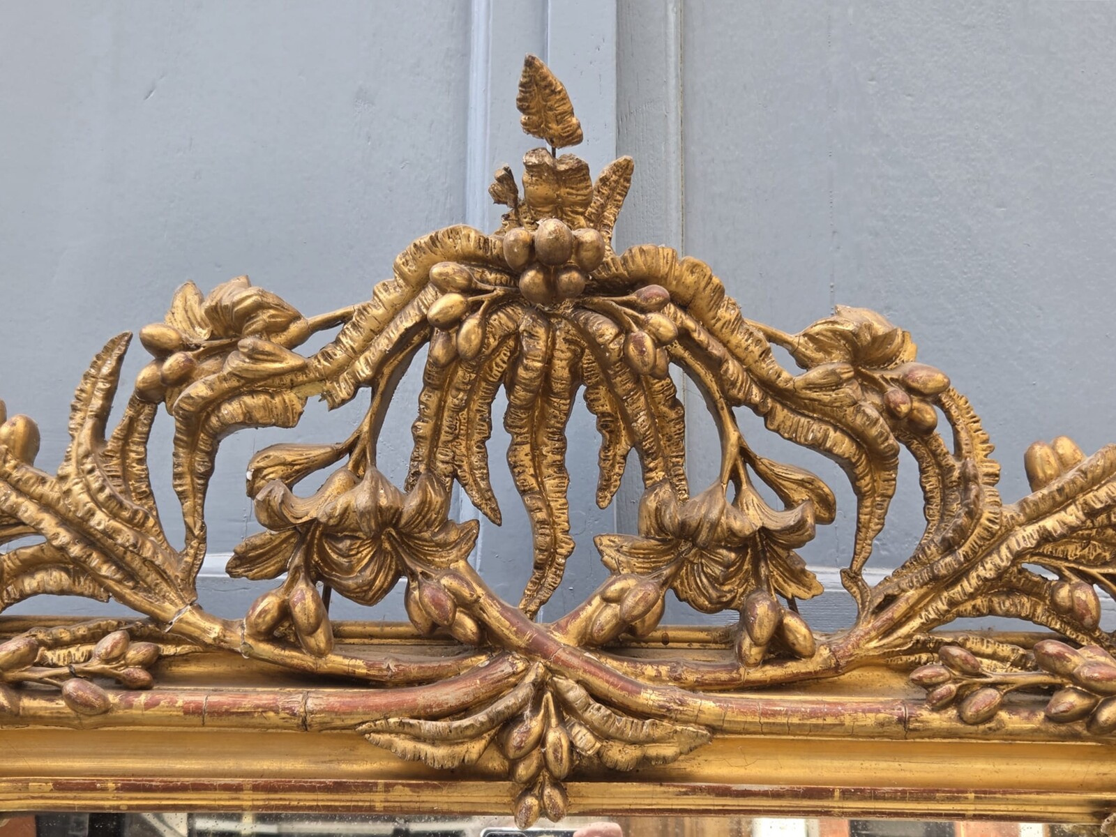 Fireplace mirror in wood and gilded stucco, 19th