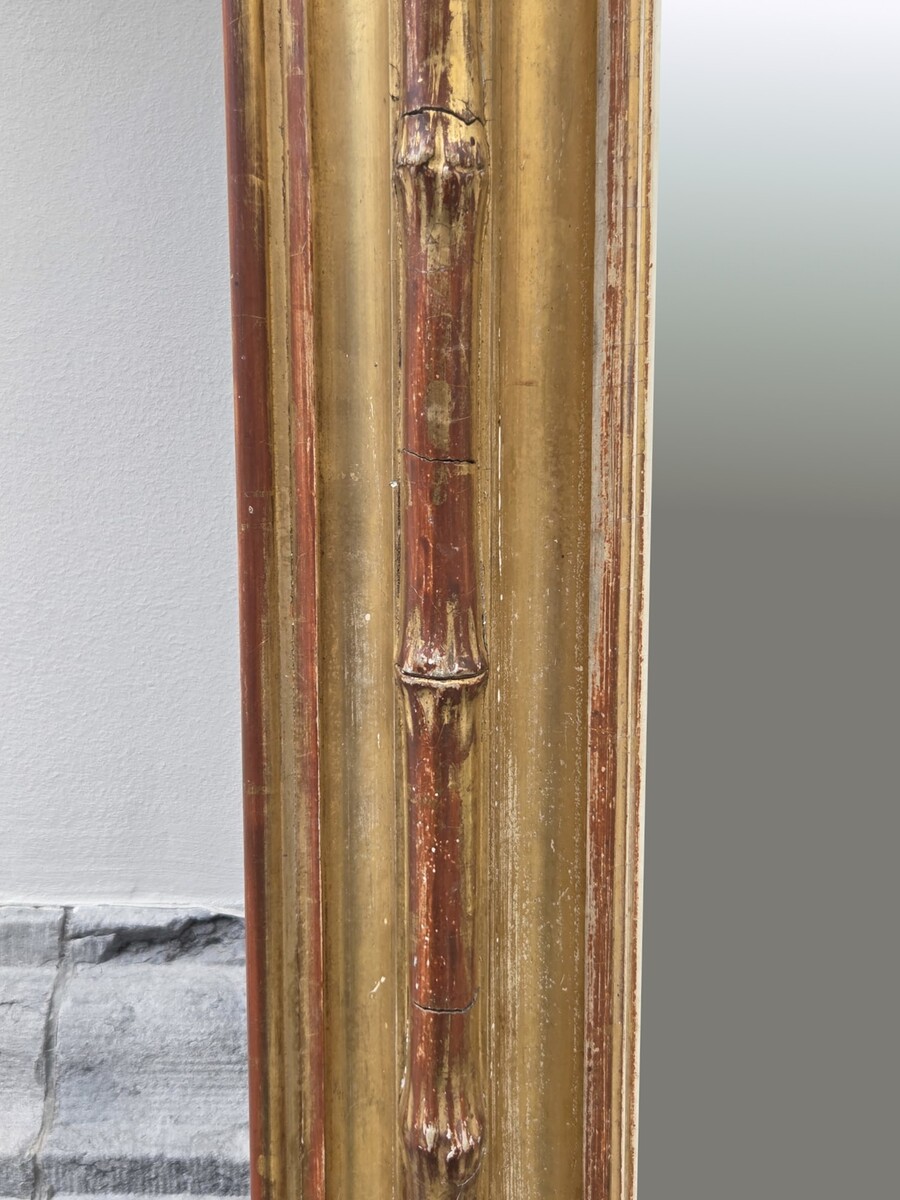 Fireplace mirror in wood and gilded stucco, 19th