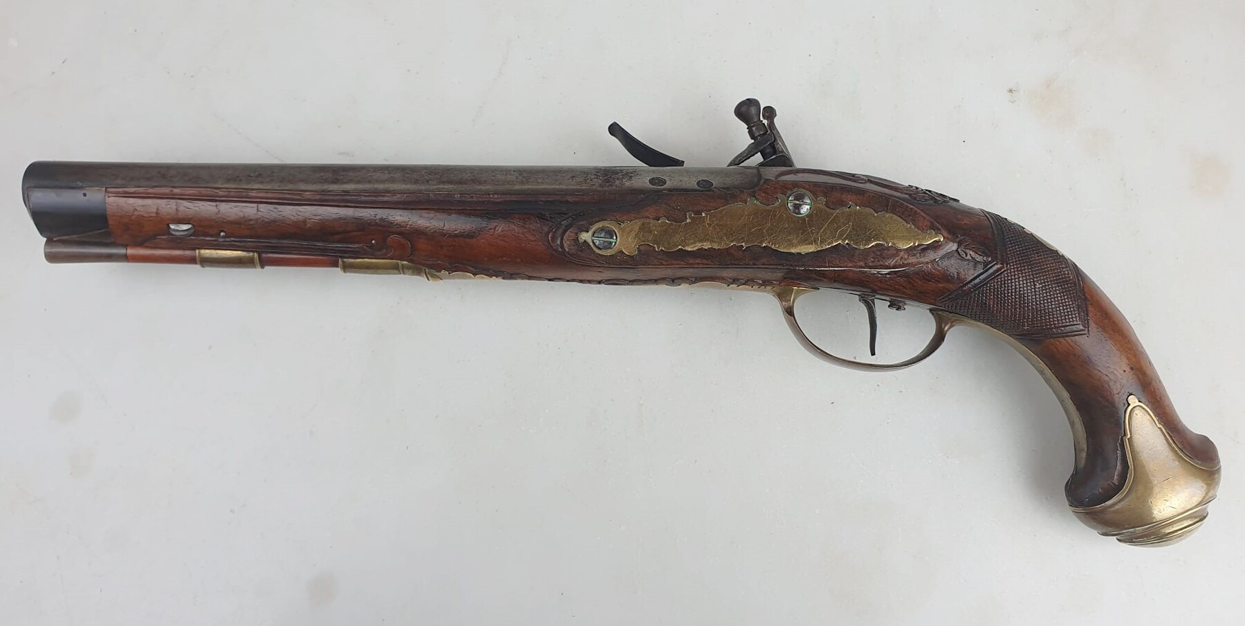 Flintlock pistol, punched and signed conon, bronze mounts, worked wooden mount, inch piece, Germany circa 1780