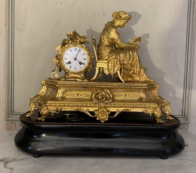 Gilt bronze clock by Revillou