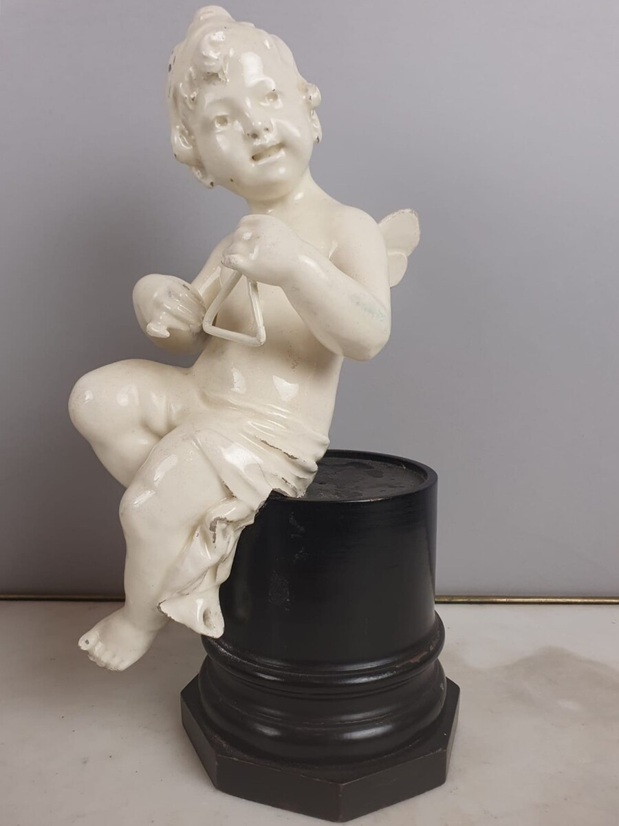 Group of 5 earthenware musician cherubs, late 19th, early 20th. Height of the largest: 35 cm.