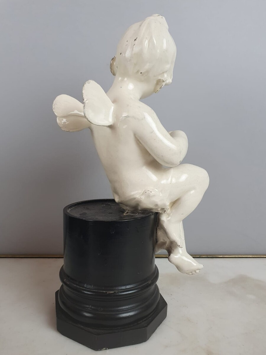 Group of 5 earthenware musician cherubs, late 19th, early 20th. Height of the largest: 35 cm.