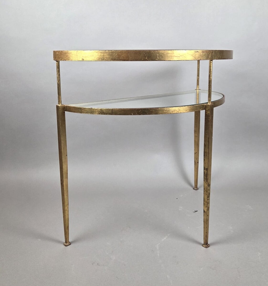 Half-moon console table in gilded wrought iron with glass shelves