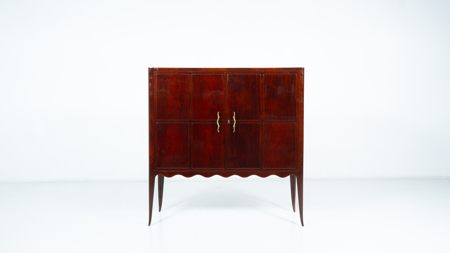 In the style of Paolo Buffa, mahogany cabinet, Italy circa 1950