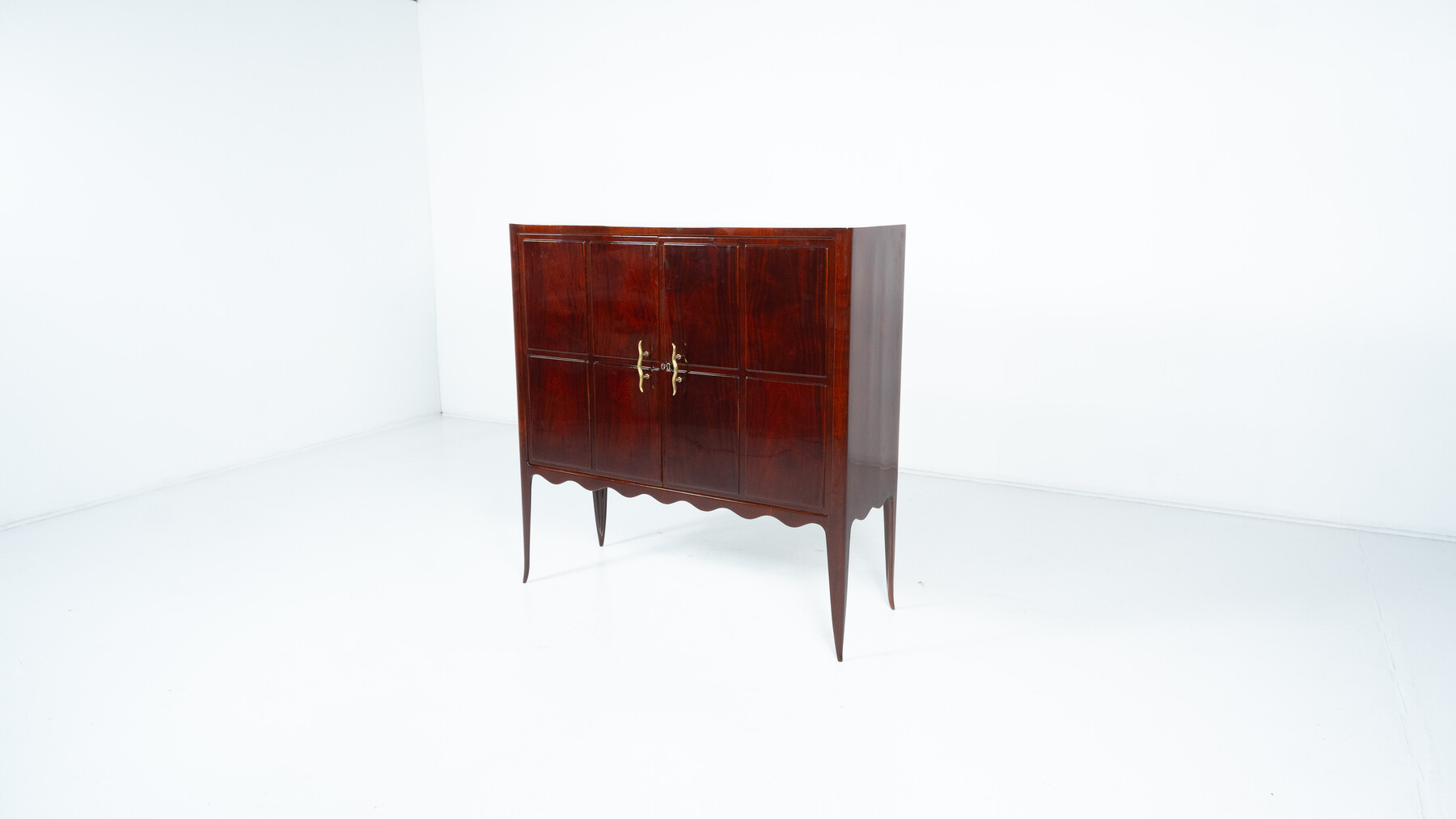 In the style of Paolo Buffa, mahogany cabinet, Italy circa 1950