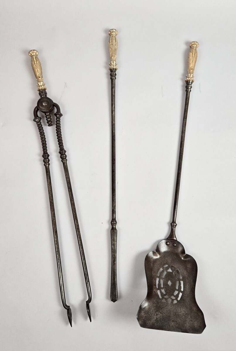 Iron and gilt bronze fireplace set, 19th century