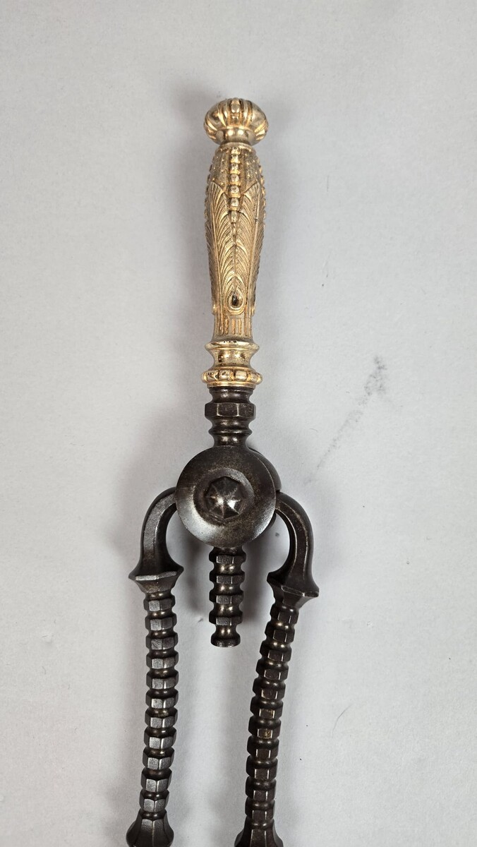 Iron and gilt bronze fireplace set, 19th century