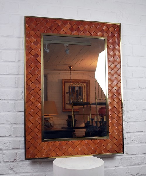 leather and brass mirror
