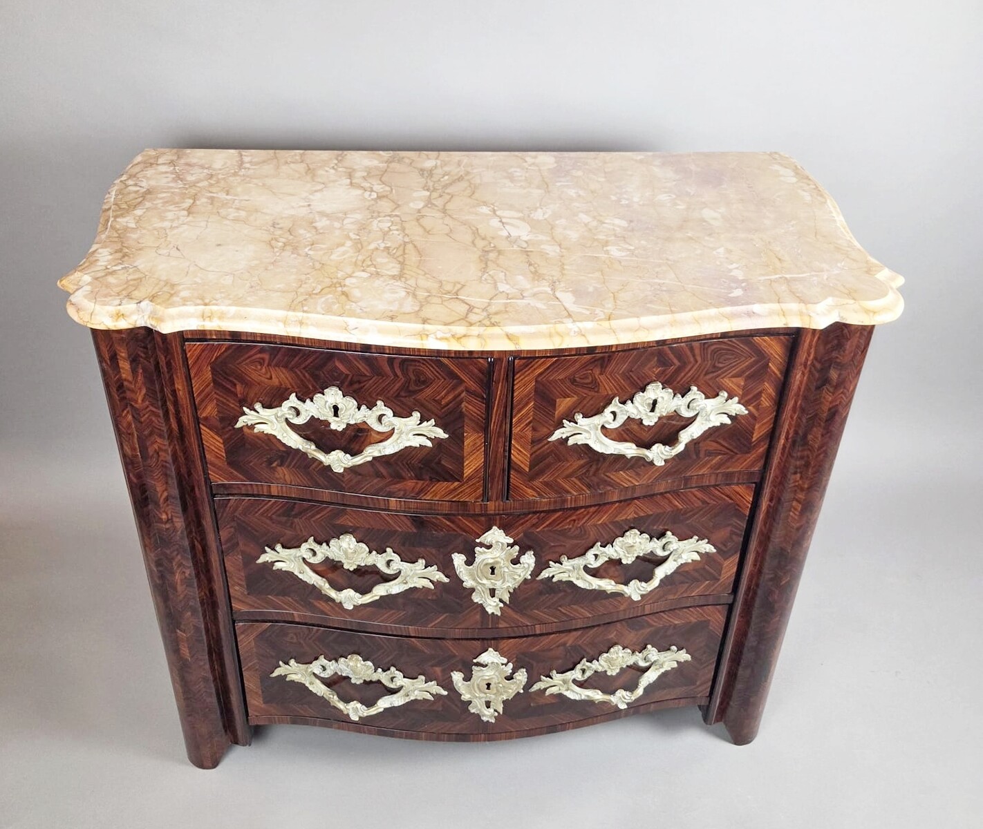 Louis XIV chest of drawers with rosewood marquetry and gilded bronze fittings, 18th century