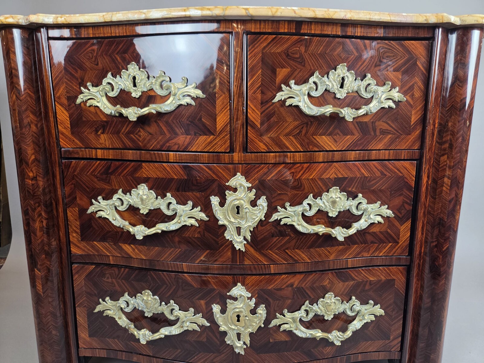 Louis XIV chest of drawers with rosewood marquetry and gilded bronze fittings, 18th century