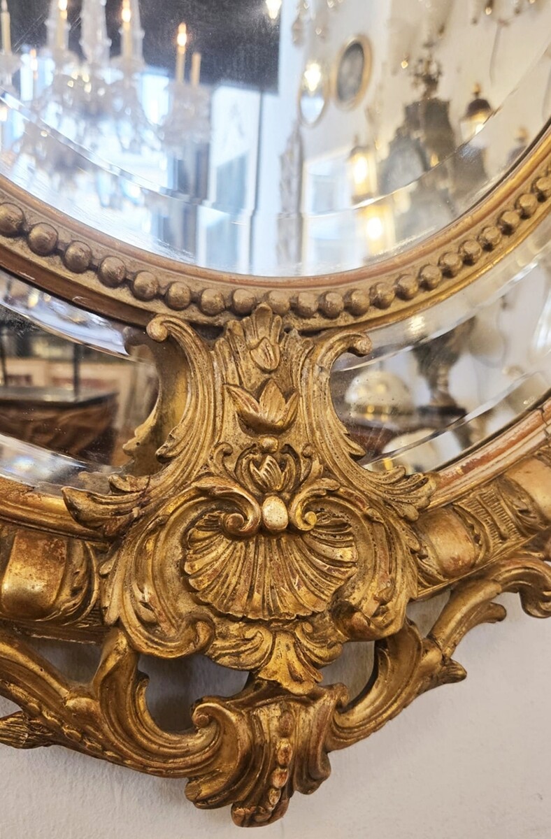 Louis XIV style medallion mirror in wood and gilded stucco, 19th