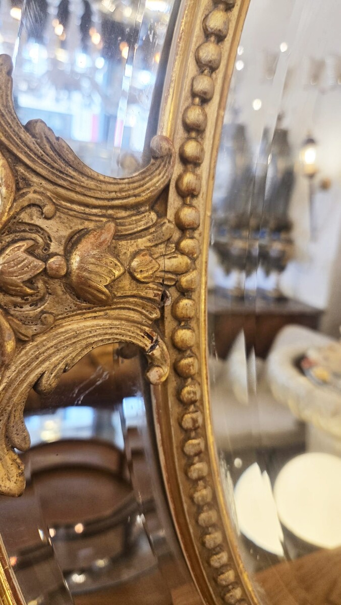 Louis XIV style medallion mirror in wood and gilded stucco, 19th