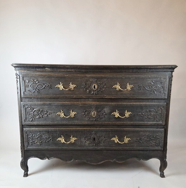 Louis XV style chest of drawers in patinated wood