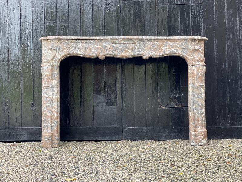 Louis XV style fireplace in gray ardennese marble