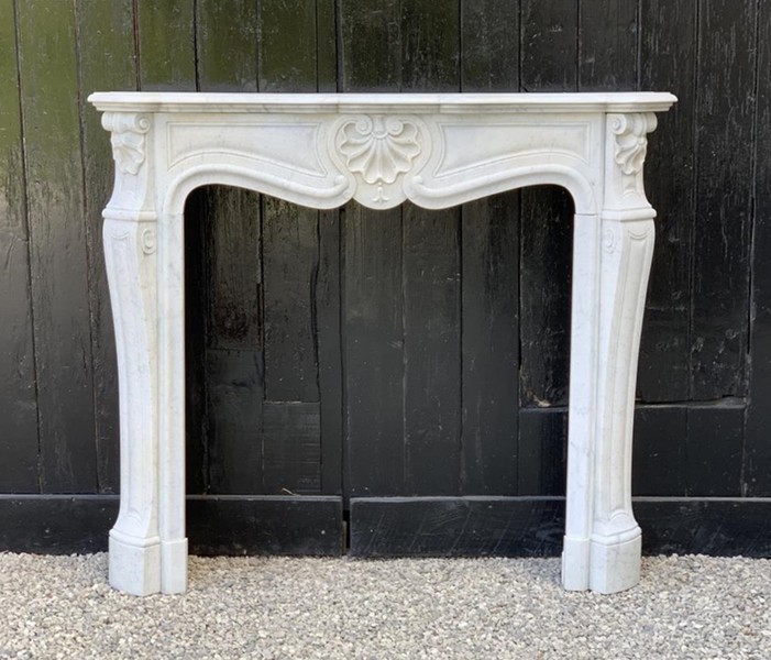 Louis XV style fireplace in white carrara marble