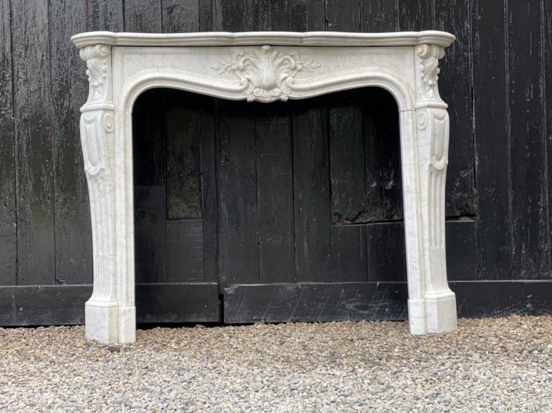 Louis XV style fireplace in white carrara marble 