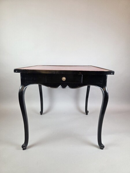 Louis XV style games table in black lacquered wood, 19th century