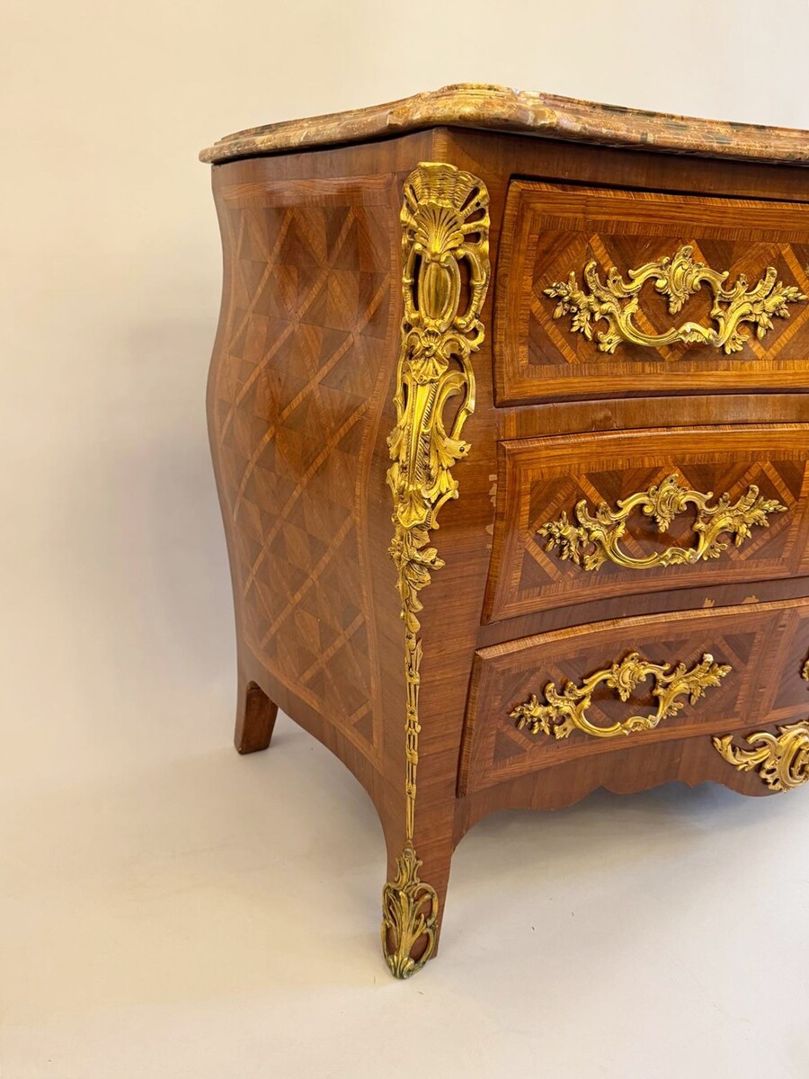 Louis XV style marquetry crossbow chest of drawers