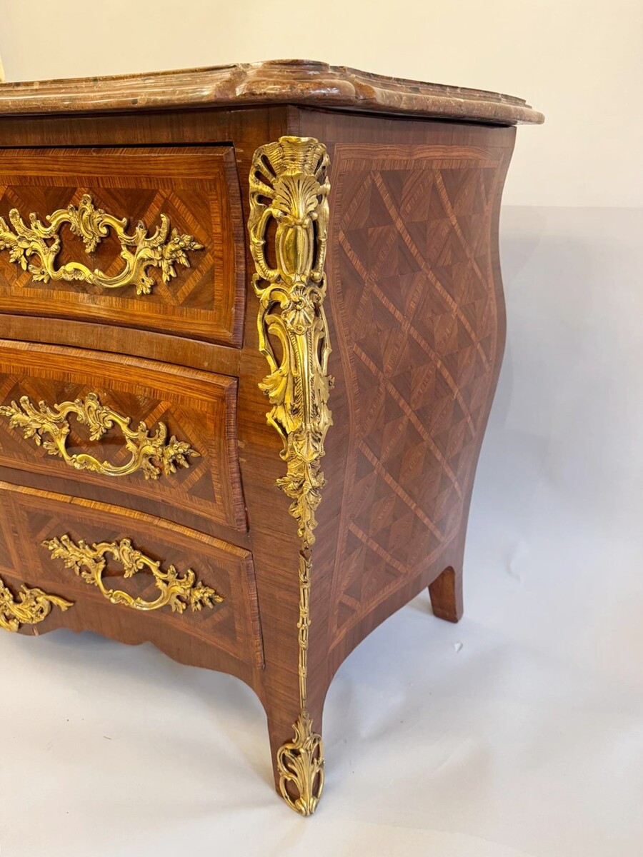 Louis XV style marquetry crossbow chest of drawers