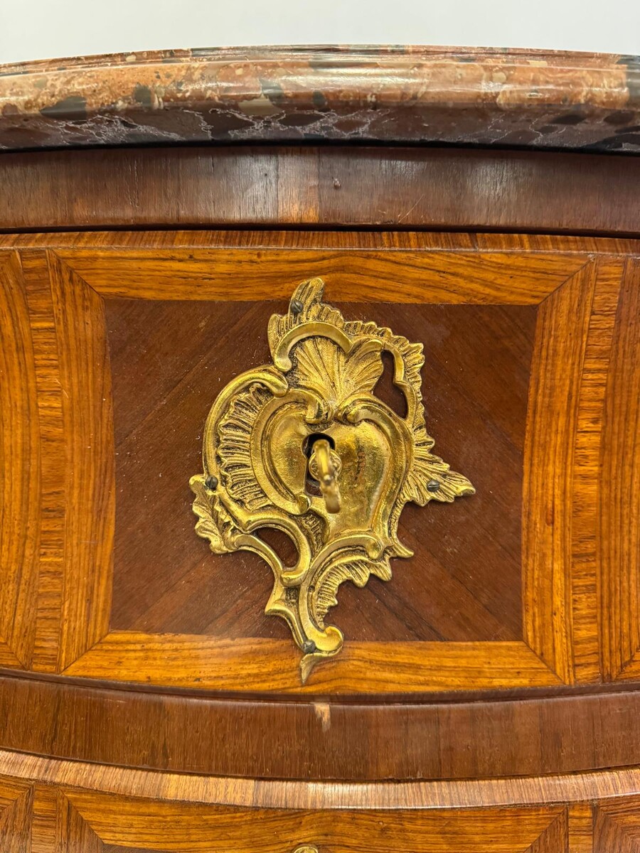 Louis XV style marquetry crossbow chest of drawers