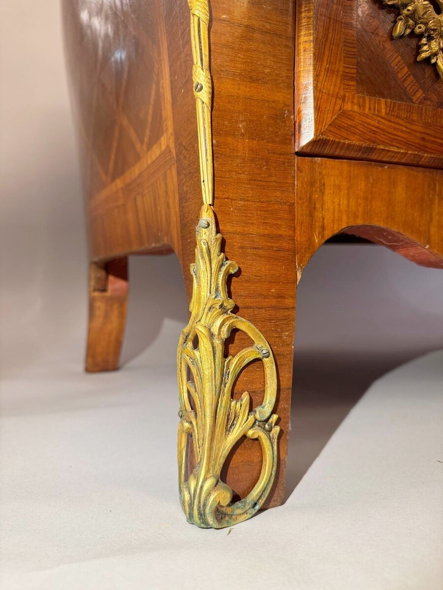 Louis XV style marquetry crossbow chest of drawers