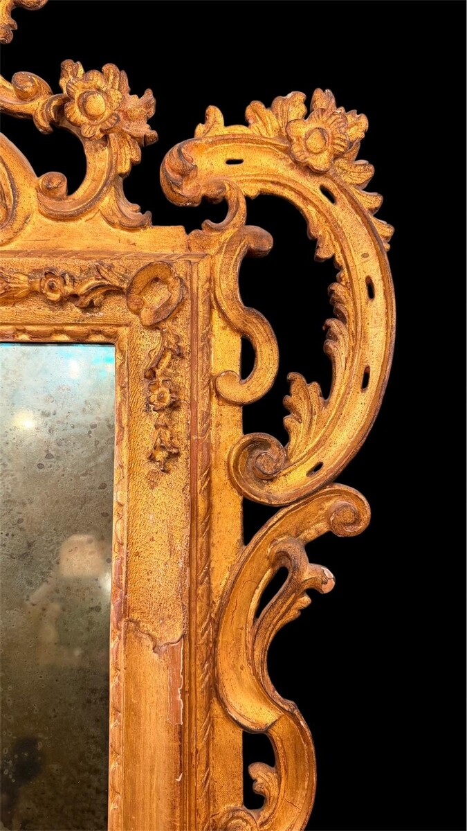Louis XV style mirror in giltwood, 19th