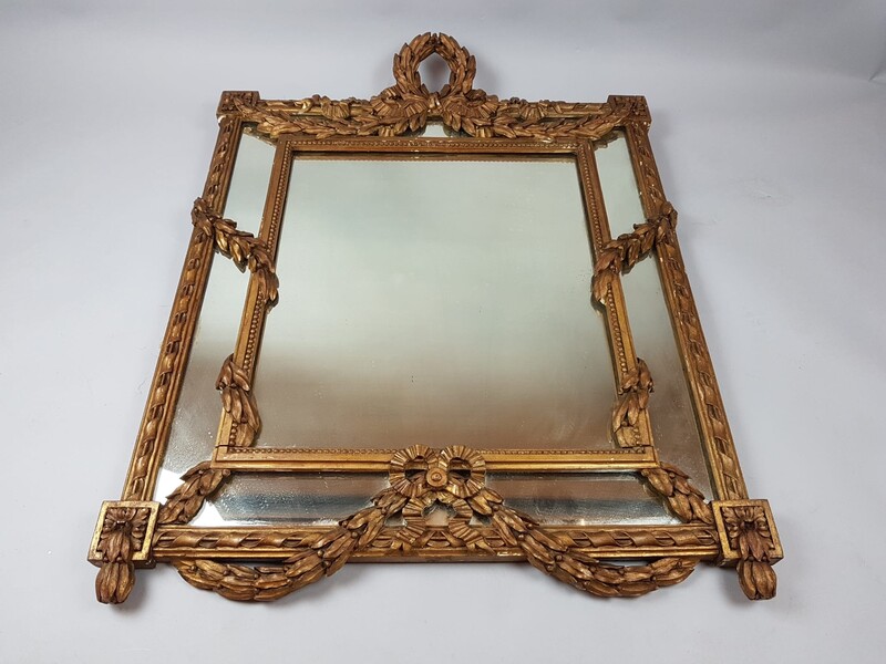 Louis XVI style mirror in gilded wood, 19th