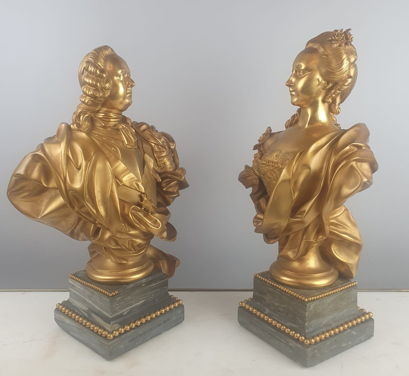Maison Millet in Paris, pair of gilt bronze busts