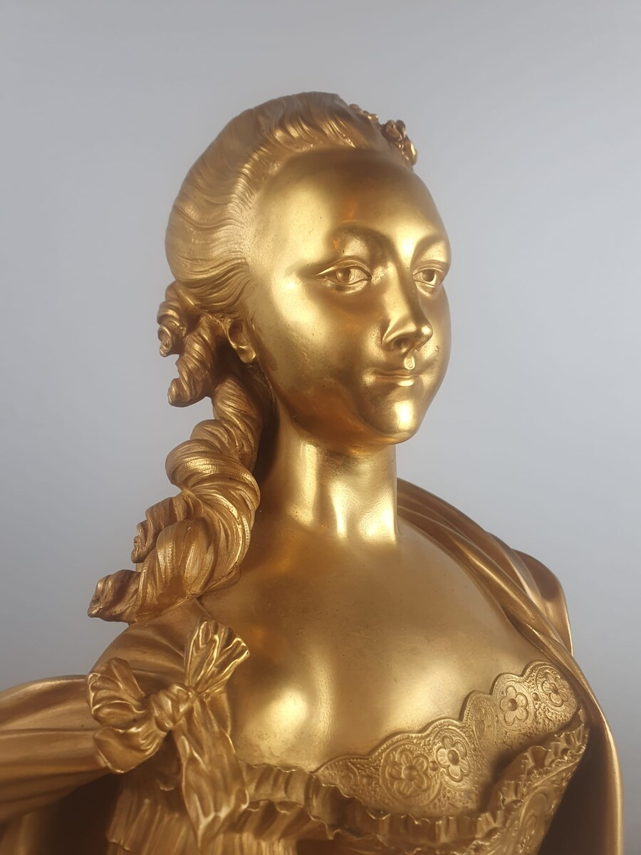 Maison Millet in Paris, pair of gilt bronze busts
