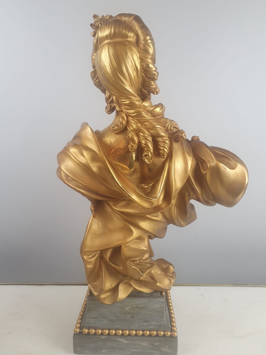 Maison Millet in Paris, pair of gilt bronze busts