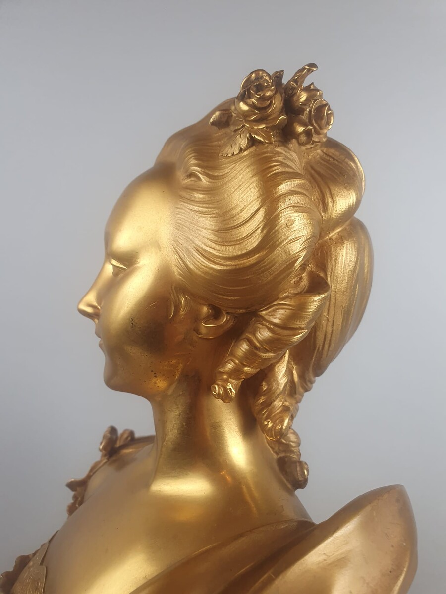 Maison Millet in Paris, pair of gilt bronze busts