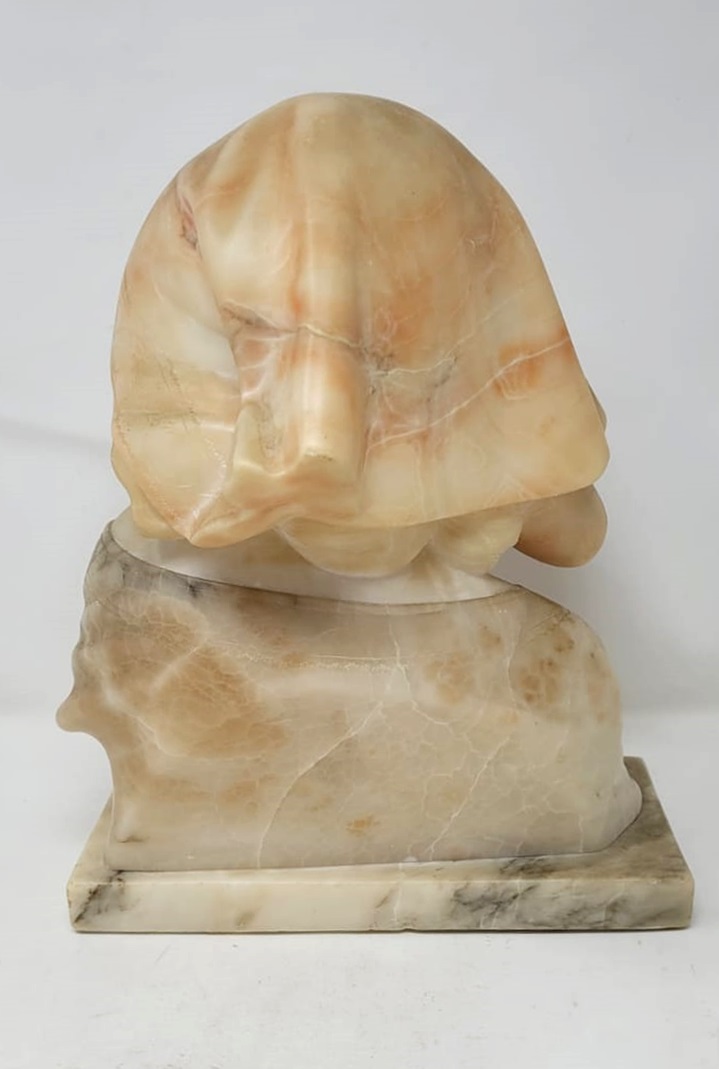 Marble and alabaster bust representing a young girl