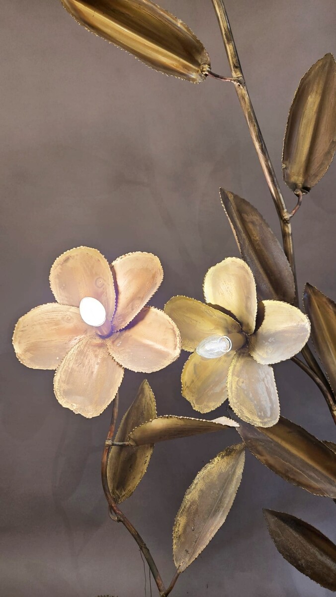 Metal floor lamp decorated with lotus flowers