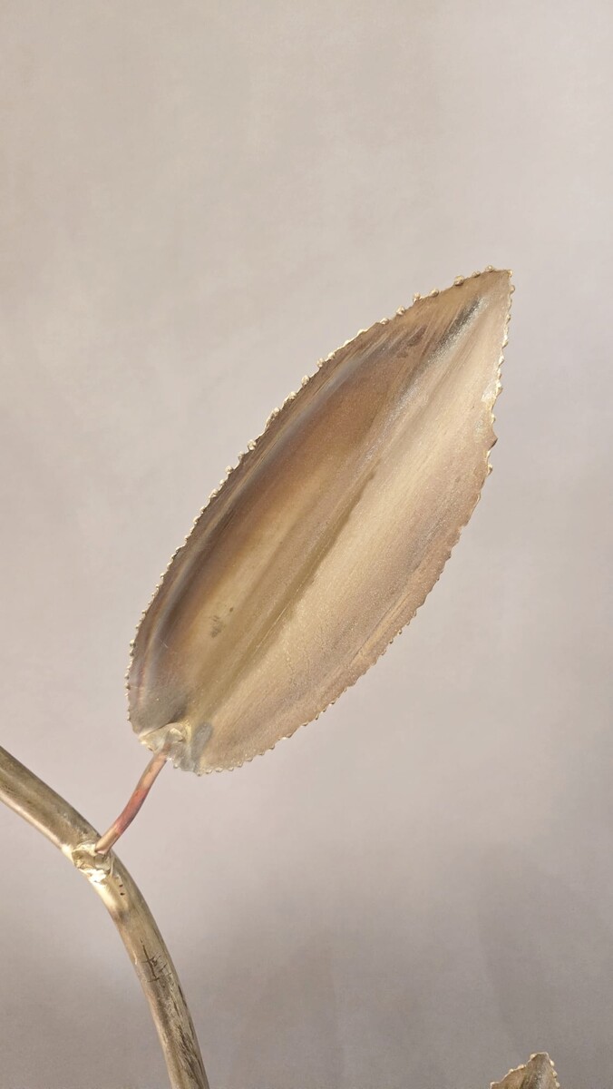 Metal floor lamp decorated with lotus flowers