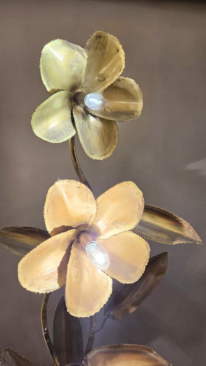 Metal floor lamp decorated with lotus flowers