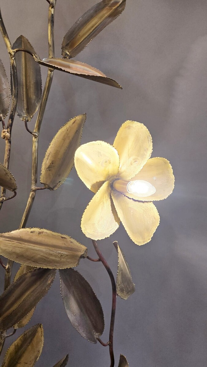 Metal floor lamp decorated with lotus flowers