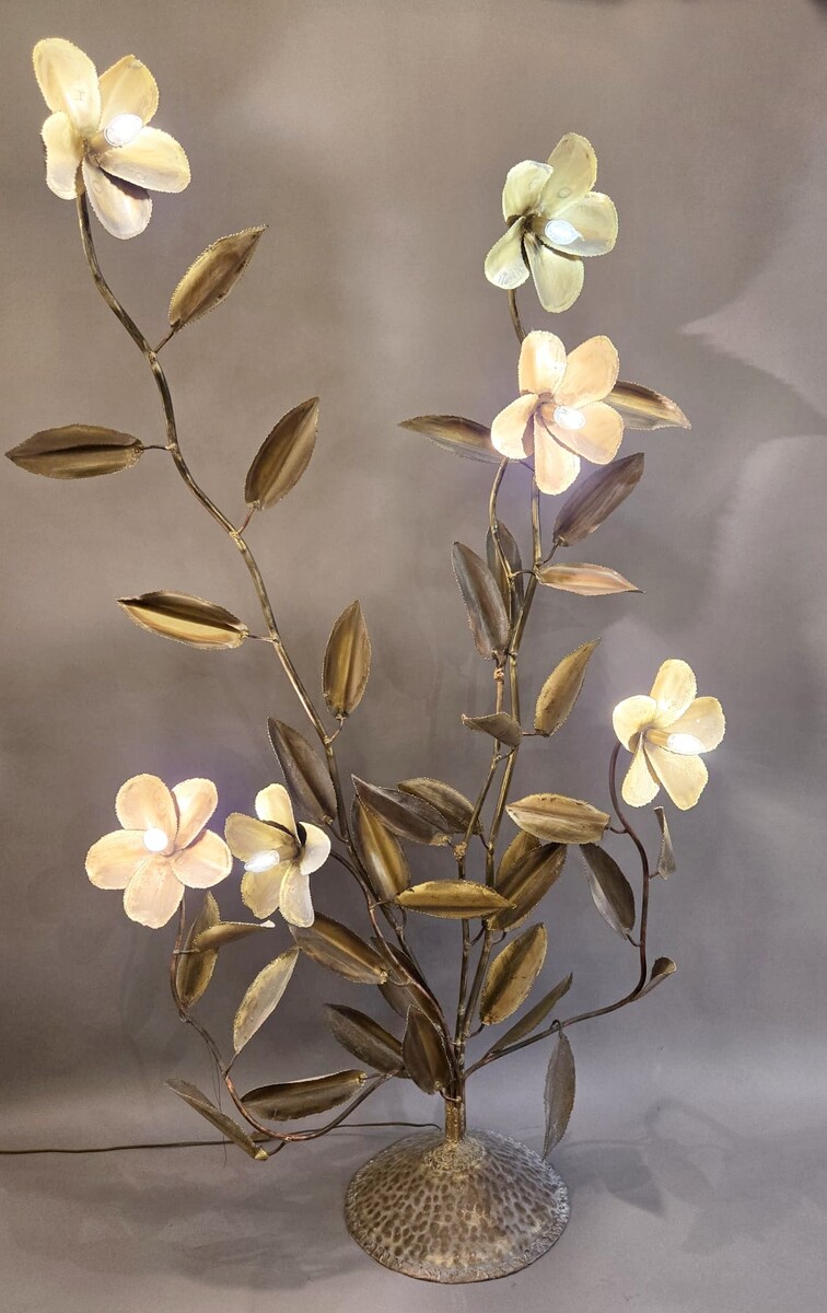 Metal floor lamp decorated with lotus flowers