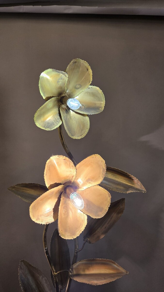 Metal floor lamp decorated with lotus flowers