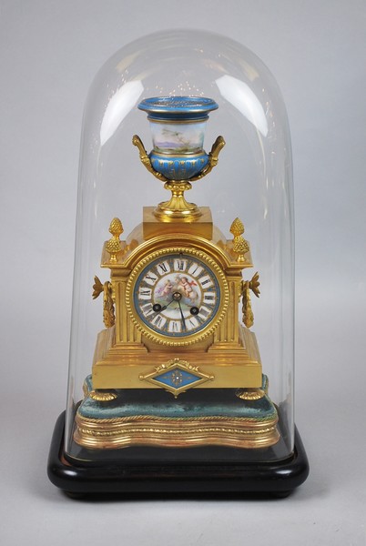 Napoleon III clock under a Louis XVI style globe