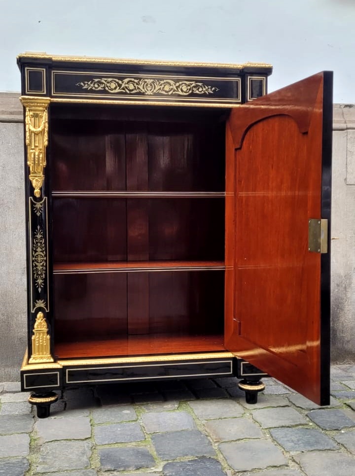 Napoleon III support unit in blackened pear wood and brass marquetry entirely restored by us