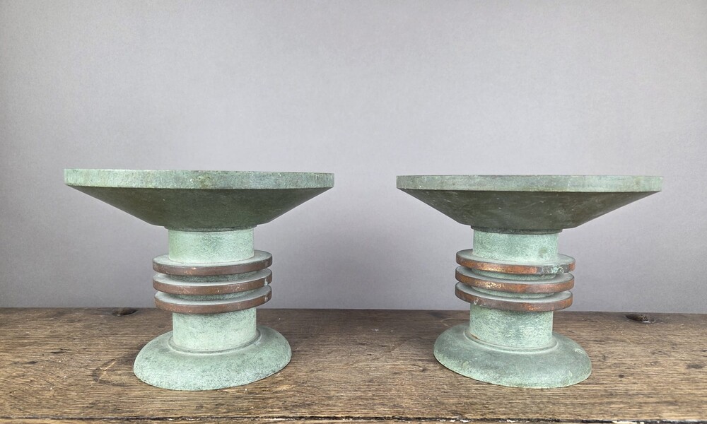 Pair of Art Deco bronze candle-holders