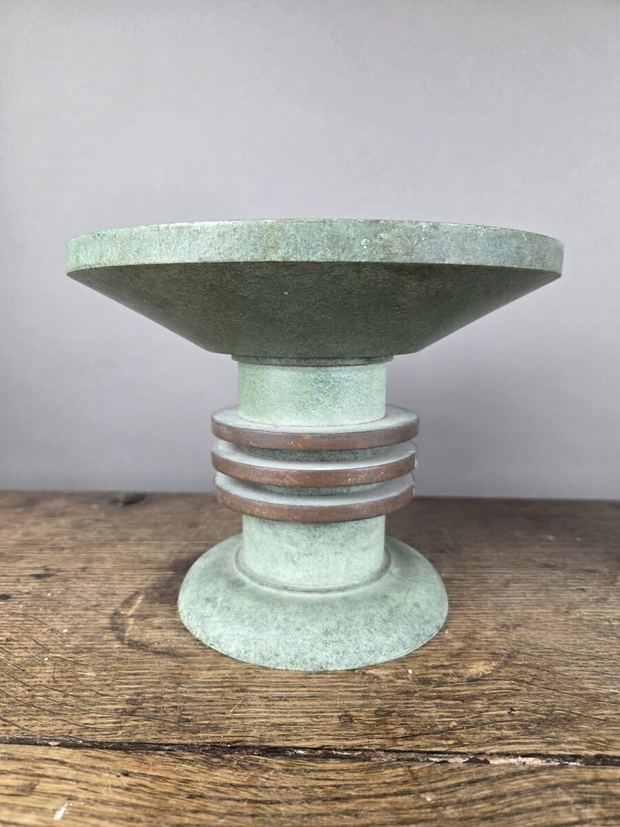 Pair of Art Deco bronze candle-holders