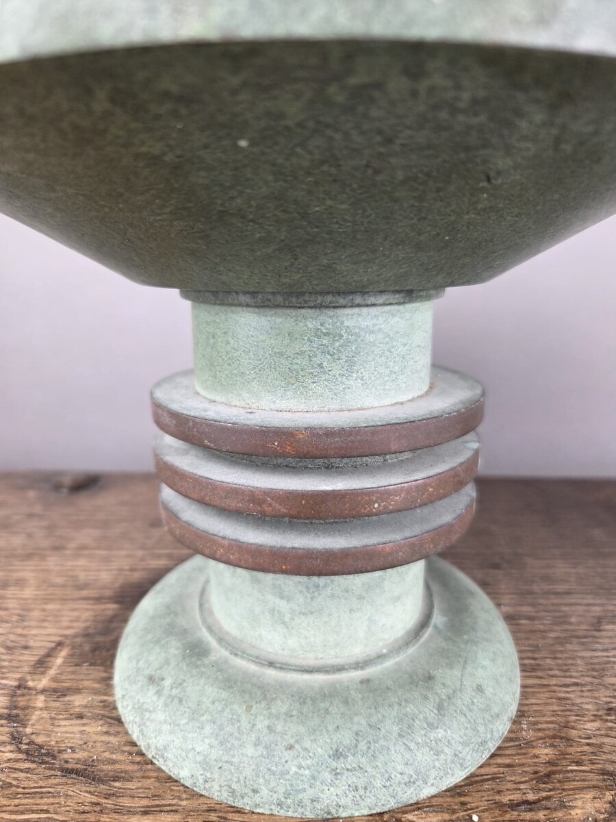 Pair of Art Deco bronze candle-holders
