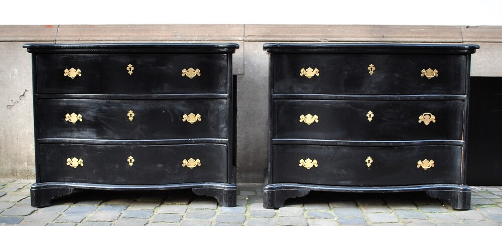 Pair of black patinated chest of drawers