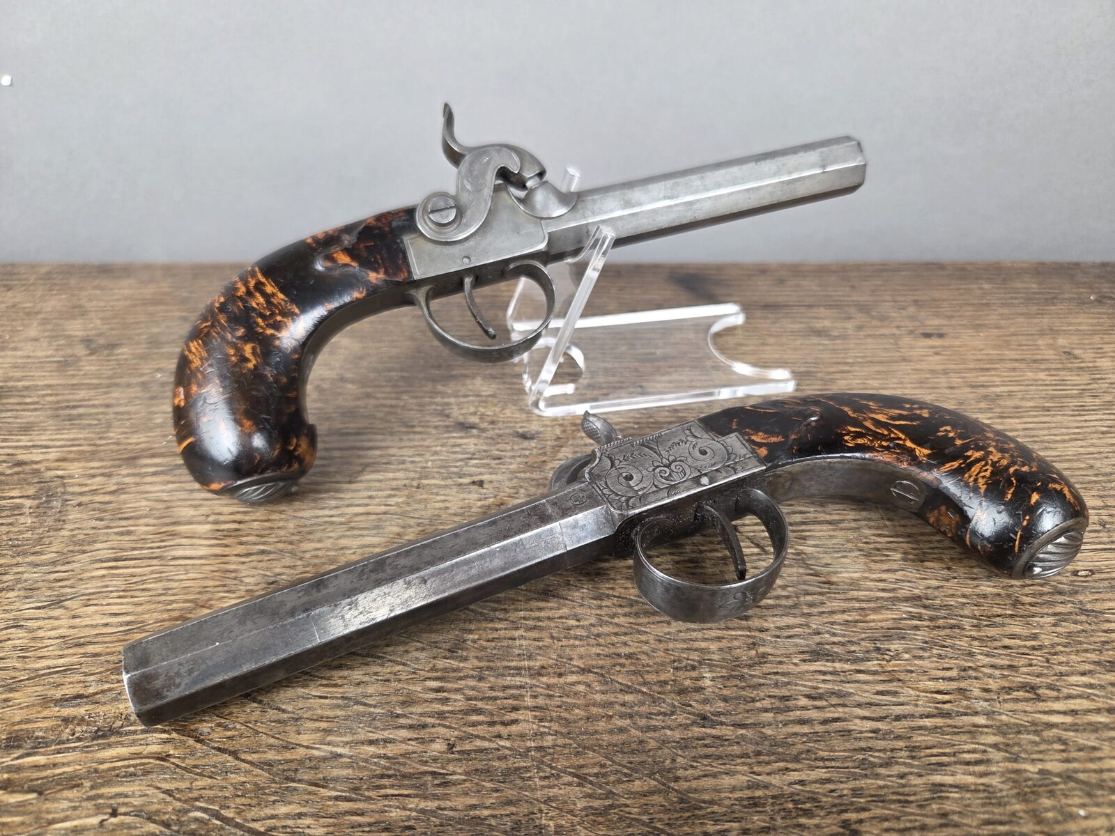 Pair of box pistols, Liège circa 1840, side hammer, walnut stock with 